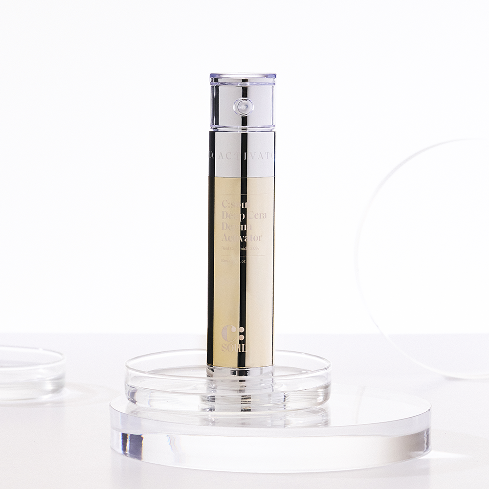C:soul Deep Cera Derma Activator displayed upright on a clear circular platform